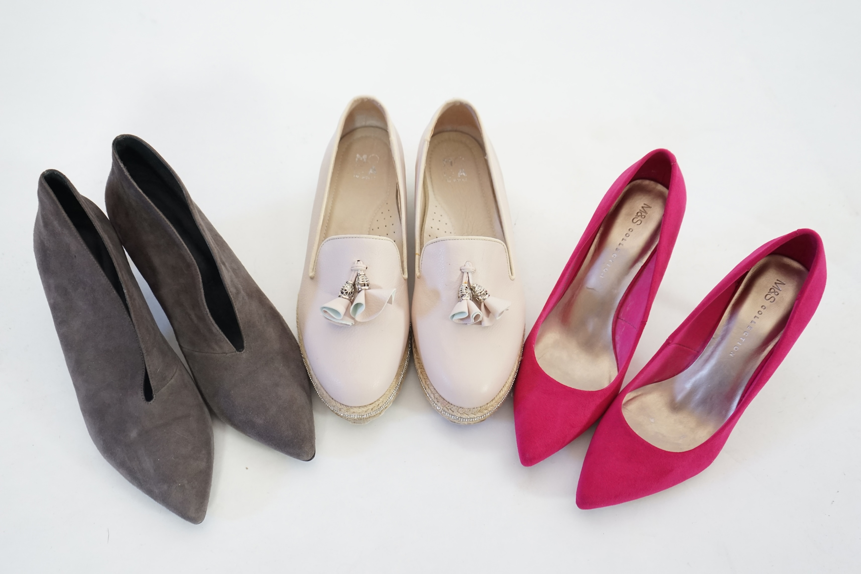 Three pairs of lady's shoes, Jigsaw V front shoe boot size 39, Marks & Spencer bright pink suede size 5.5 and a pair of Moda in Pelle buff platformed flats with metallic silver strip through sole. Proceeds to Happy Paws